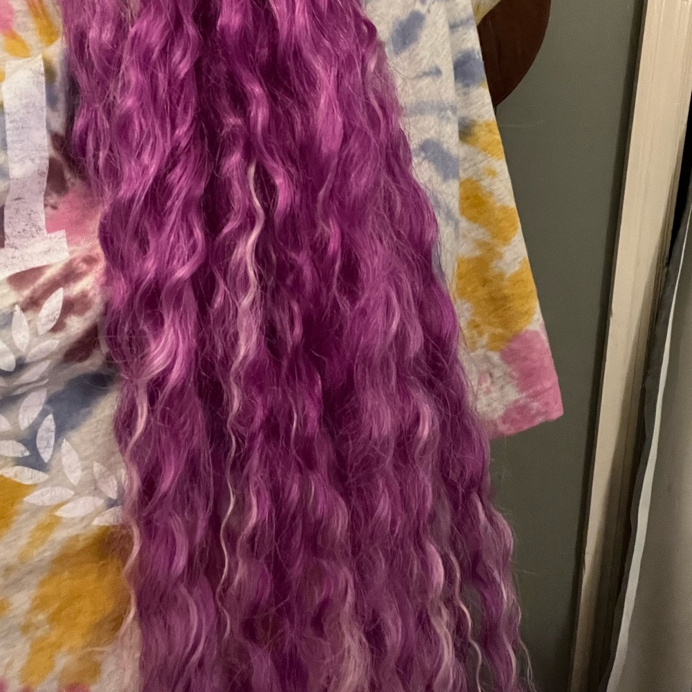 Purple with light pink curly braids